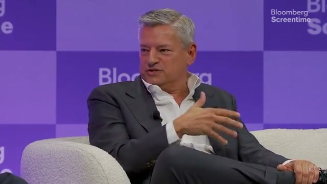 Sarandos responds to questions about changes in major creator agreements. Image: frame from the Bloomberg Screentime interview.