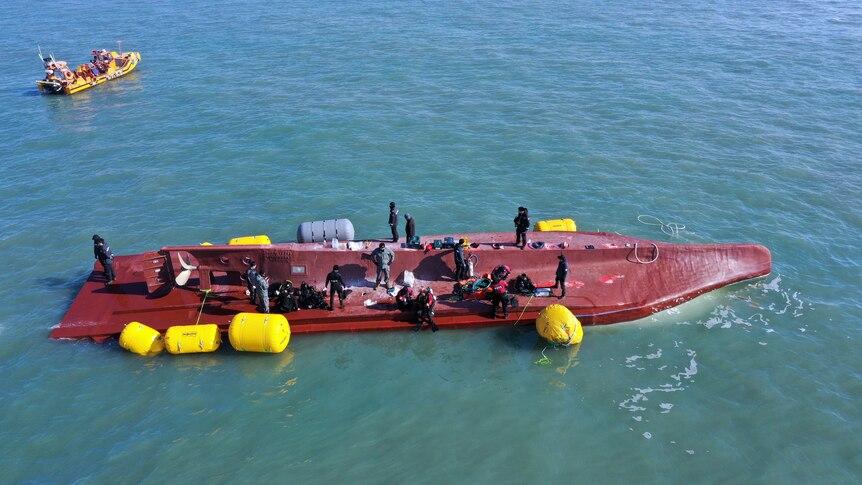Authorities searching for nine fisherman after boat capsizes off South Korean coast - ABC News