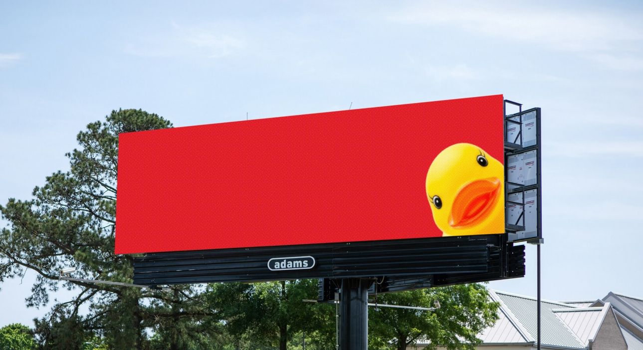 Adams Outdoor Advertising Reveals the Story Behind the Yellow Rubber Duck Billboards