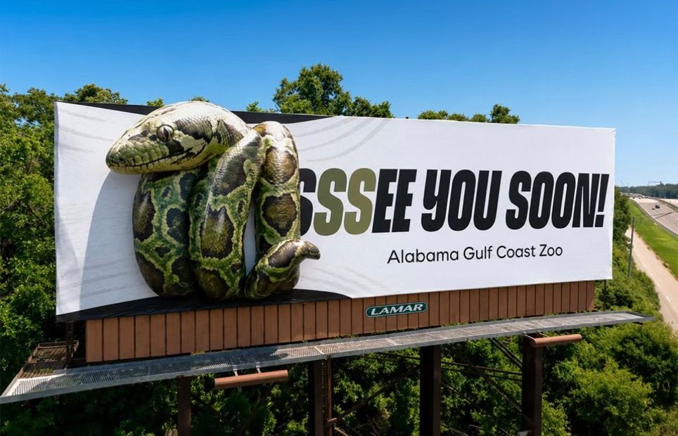 Snake Slithers Onto Billboard in Eye-Catching Zoo Campaign