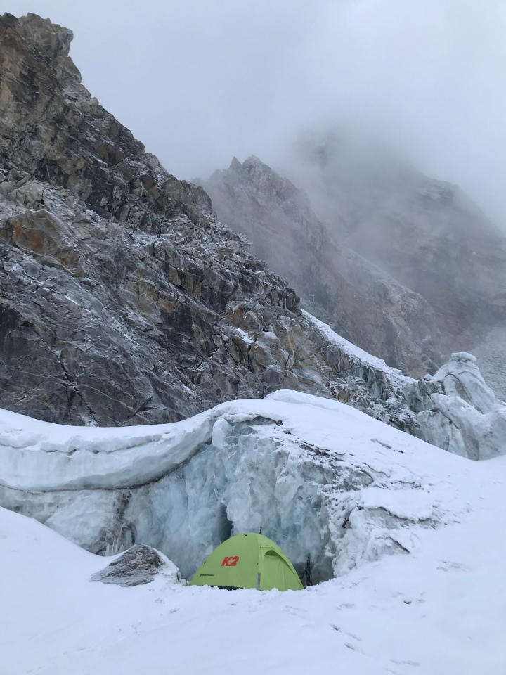Climbers ascending the Himalayas in alpine style.