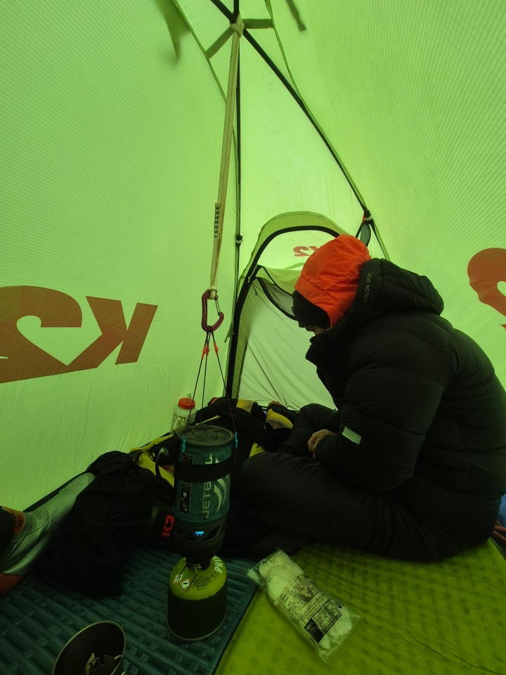 Climbers preparing to climb the Himalayas in alpine style.