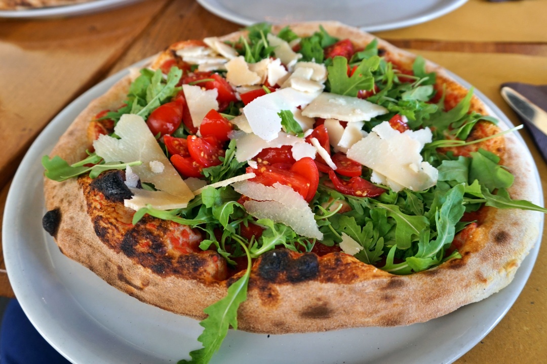 Gustapizza, a popular wood-fired pizza spot on Piazza Santo Spirito